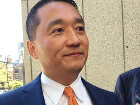 Benjamin Wey leaves federal court, Wednesday, Aug. 9, 2017, in New York. The Wall Street executive says he's ready to restart his business a day after prosecutors dropped criminal charges against him. Wey returned to Manhattan federal court Wednesday to get his electronic ankle bracelet removed. (AP Photo/Larry Neumeister)