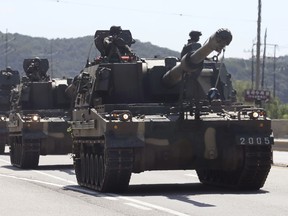 South Korean army's K-9 self-propelled howitzers move on the street in Paju, South Korea on Aug. 29, 2017