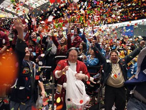 Dow cracks 22,000 for first time.
