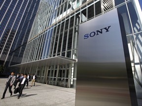 FILE - In this Friday, April 28, 2017, file photo, people walk out from the headquarters of Sony Corp. in Tokyo. Sony's fiscal first quarter profit nearly quadrupled compared to a year ago, boosted by its lucrative image sensor and other businesses, highlighting a gradual recovery at the Japanese electronics and entertainment company. Sony reported Tuesday, Aug. 1, an 80.9 billion yen ($735 million) April-June profit, up dramatically from 21.2 billion yen the same period a year ago. (AP Photo/Shuji Kajiyama, File)