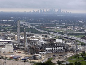 ADDS NAME OF REFINERY - This aerial photo shows the Flint Hills Resources oil refinery near downtown Houston on Tuesday, Aug. 29, 2017. (AP Photo/D1avid J. Phillip)