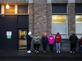People wait in line for the Evergreen Treatment Services methadone clinic to open in Hoquiam, Wash., Thursday, June 15, 2017. Penn State sociologist Shannon Monnat spent last fall plotting places on a map experiencing a rise in "deaths of despair" _ from drugs, alcohol and suicide wrought by the decimation of jobs that used to bring dignity. On Election Day, a television map of Trump's victory looked eerily similar to hers documenting death, from New England through the Rust Belt all the way here, to the rural coast of Washington. (AP Photo/David Goldman)