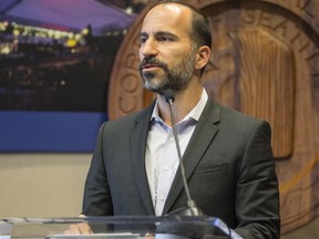 FILE - In this April 2, 2015 file photo, Expedia's CEO Dara Khosrowshahi announces his company is moving 3,000 employees from Bellevue, Wash., to Seattle's waterfront in 2016, during a news conference in Seattle. Two people briefed on the matter said Sunday, Aug. 27, 2017, that Khosrowshahi has been named CEO of ride-hailing giant Uber Technologies Inc. (Steve Ringman/The Seattle Times via AP)