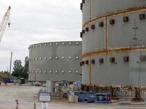 FILE - In this Sept. 21, 2016, file photo, parts of a containment building for the V.C. Summer Nuclear Station is shown near Jenkinsville, S.C., during a media tour of the facility. Proponents of nuclear power are pushing to revive a failed project to build two reactors in South Carolina, arguing that the demise of the $14 billion venture could signal doom for an industry that supplies one-fifth of the nation's electricity. The July 31 suspension of the partly-completed V.C. Summer project near Columbia, S.C., leaves two nuclear reactors under construction in Georgia as the only ones being built in the U.S.  (AP Photo/Chuck Burton, File)