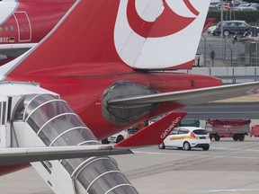 FILE -In this Sept. 29, 2016 file photo shows an  aircraft of the Air Berlin company on the runway of Dusseldorf airport in Germany. Struggling German carrier Air Berlin says it's filing for bankruptcy after its main shareholder, Abu Dhabi-based Etihad, said it would make no more financing available. The Economy Ministry and Transport Ministry said Tuesday Aug. 15, 2017  in a statement that the airline would get a loan of 150 million euros ($177 million) so that it can continue flights for the time being.  (Bernd Thissen/dpa via AP,file)