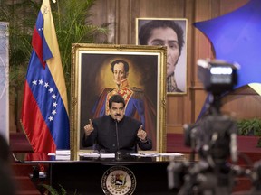 Venezuela's President Nicolas Maduro speaks at a news conference in Caracas, Venezuela, Tuesday, Aug. 22, 2017. Immigration authorities in Colombia announced that Venezuela's ousted chief prosecutor Luisa Ortega Diaz is on her way to Brazil. Ortega said that Maduro removed her in order to stop a probe linking him and his inner circle to nearly $100 million in bribes from Brazilian construction company Odebrecht. (AP Photo/Ariana Cubillos)