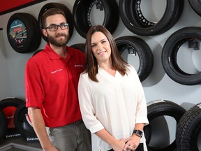 Erik Fielding and his wife, Lindsay, at their repair shop in Kingston, Ont.