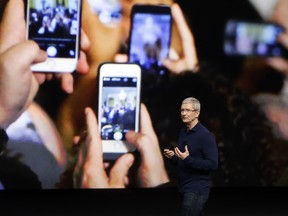 Apple CEO Tim Cook announces the new iPhone 7 in San Francisco
