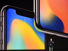 Senior Vice President of Worldwide Marketing at Apple Philip Schiller speaks about the iPhone X at Apple's new headquarters in Cupertino, California on September 12, 2017.
