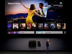 Apple CEO Tim Cook speaks about Apple TV during a media event at Apple's new headquarters in Cupertino