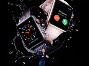 Apple CEO Tim Cook shows the new Apple Watch Series 3 at the Steve Jobs Theater.