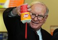 U.S. billionaire investor Warren Buffett flips over a Dairy Queen Blizzard treat