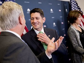 House Speaker Paul Ryan of Wis., center, speaks with House Majority Leader Kevin McCarthy of Calif., left, as they arrive for a news conference following a GOP caucus meeting on Capitol Hill, Wednesday, Sept. 13, 2017, in Washington. (AP Photo/Andrew Harnik)