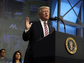 President Donald Trump speaks to the National Association of Manufactures at the Mandarin Oriental hotel, Friday, Sept. 29, 2017, in Washington. (AP Photo/Evan Vucci)