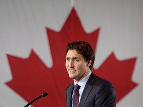 Prime minister Justin Trudeau on stage at Liberal party headquarters in Montreal early Tuesday, Oct. 20, 2015 after winning the 42nd Canadian general election.