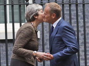 European Council President Donald Tusk meets British Prime Minister Theresa May at 10 Downing Street in London, Tuesday, Sept. 26, 2017.(AP Photo/Frank Augstein)