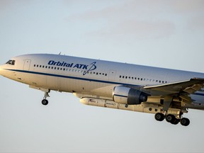 FILE - In this Thursday, Dec. 15, 2016, file photo, the Orbital ATK L-1011 aircraft lifts off from Cape Canaveral Air Force Station, Fla. Northrop Grumman is buying aerospace and defense technology company Orbital ATK for about $7.8 billion as activity in the sector heats up along with global tensions, announced Monday, Sept. 18, 2017. (Craig Bailey/Florida Today via AP)