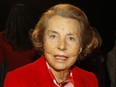 In this Jan. 26, 2011 file photo, l'Oreal cosmetics heiress Liliane Bettencourt attends Franck Sorbier's spring/summer 2011 Haute Couture fashion collection, in Paris. Bettencourt has died at the age of 94 at her home, her family announced.