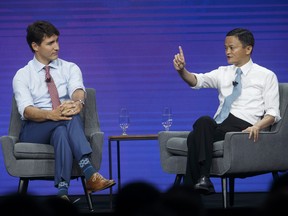 Canada's Prime Minister Justin Trudeau, left, listens to Jack Ma, chairman of Alibaba Group Holding Ltd., right, during the Gateway '17 Canada conference in Toronto.