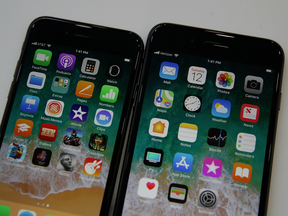 The iPhone 8 (L) and iPhone 8 Plus are displayed during a Apple event at the Steve Jobs Theater on the Apple Park campus on Sept. 12