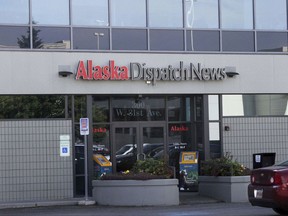 FILE - In this Sept. 11, 2017, file photo, the current offices of the Alaska Dispatch news are shown in a strip mall in Anchorage, Alaska. The new owners of Alaska's largest newspaper have laid off reporters, editors and other employees just days after a bankruptcy judge approved the sale the Alaska Dispatch News.  Co-Publisher Ryan Binkley wouldn't disclose how many of the 212 employees were laid off, but described it in a story published Thursday, Sept. 21 as a significant change in the size of the newspaper. (AP Photo/Mark Thiessen, File)