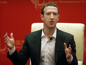 FILE - In this Saturday, March 19, 2016, file photo, Facebook CEO Mark Zuckerberg speaks during a panel discussion in Beijing. Facebook was born in a bubble and grew up coddled for years with little regulation, lots of reverence and unchecked growth that has made it into a societal force with incredible power over our lives. Now, like a rich kid stumbling out into the real world after a few cushy years at Harvard, the world's biggest social network is starting to face the consequences of not preventing the often unforeseen problems that keep cropping up on its platform, from false news to real ads from agents of the Russian government looking to influence the U.S. election. (AP Photo/Mark Schiefelbein, File)