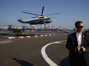 Marine One, carrying President Donald Trump, lands at the Downtown Manhattan Heliport, Sunday, Sept. 17, 2017, in New York. (AP Photo/Evan Vucci)