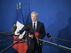 French Economy Minister Bruno Le Maire gives a press conference at Bercy Economy ministry in Paris, Wednesday, Sept. 27, 2017. Le Maire is defending a deal to merge French high-speed train maker Alstom with Germany's Seimens as crucial to keeping European industry globally competitive. (AP Photo/Kamil Zihnioglu)