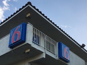 This photo shows a Motel 6 in Phoenix on Thursday, Sept. 14, 2017. Motel 6 says its employees in Phoenix will no longer work with U.S. Immigration and Customs Enforcement agents following news reports that its workers were reporting on guests they believed were in the United States illegally. (AP Photo/Anita Snow)