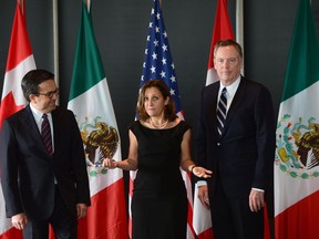 Minister of Foreign Affairs Chrystia Freeland meets for a trilateral meeting with Mexico's Secretary of Economy Ildefonso Guajardo Villarreal, left, and Ambassador Robert E. Lighthizer, United States Trade Representative, during the final day of the third round of NAFTA negotiations in Ottawa.