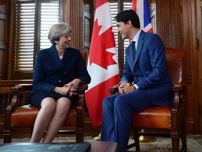 British Prime Minister Theresa May meets with Prime Minister Justin Trudeau in Ottawa.