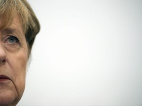 German chancellor Angela Merkel attends a party meeting at  the party's headquarters, in Berlin, Germany, Monday, Sept. 25, 2017, after Sunday's parliament elections. (Michael Kappeler/dpa via AP)