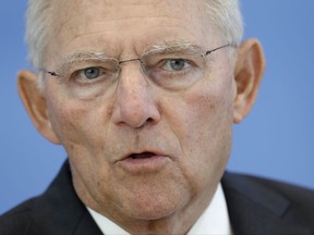 FILE - In this June 28, 2017 file photo, German Finance Minister Wolfgang Schaeuble addresses the media during a press conference on the financial outlook 2018 in Berlin. German media report that Finance Minister Wolfgang Schaeuble is set to become parliament's new speaker. News agency dpa and newspaper Bild reported Wednesday, Sept. 27, 2017, citing unidentified officials in Chancellor Angela Merkel's Union bloc, that caucus leaders will propose Schaeuble ahead of parliament's first meeting next month. (AP Photo/Michael Sohn,file )