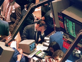 A trader on the floor of the New York Stock Exchange on October 19, 1987, after the Dow Jones dropped more than 500 points