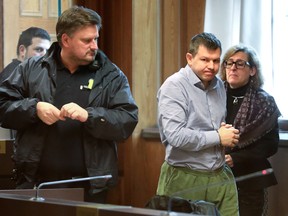 Defence attorney Cristina Bergner, right, and her client, a Bombardier employee, second right, pictured prior to the pre-trial at the Stockholm District Court in March.