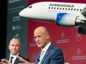 Bombardier President and CEO Alain Bellemare, left,  and Airbus CEO Tom Enders speak during a business meeting in Montreal, Friday.