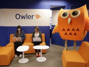 In this Tuesday, Aug. 29, 2017, photo, Owler employees Nicole Lopuch, left, and Molly Cornfield work in the company's offices in San Mateo, Calif. Many small businesses struggle because they have uncomfortable workplaces, whether it's due to space, noise or aesthetics. But many find that if they ask staffers what they want, there are ways to make their space cheerful and inspiring. (AP Photo/Marcio Jose Sanchez)