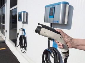 A fast-charging electric vehicle station is seen in Dartmouth, N.S., on Wednesday, August 2, 2017. The National Energy Board says Canada's addiction to fossil fuels will peak in two years but it will not affect economic growth. THE CANADIAN PRESS/Andrew Vaughan