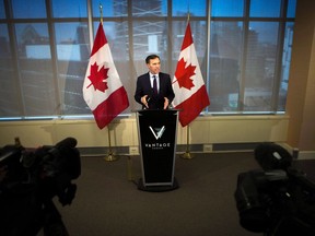 Federal Finance Minister Bill Morneau answers questions following a meeting with private sector economists in Toronto on Oct. 5, 2017. Finance Minister Bill Morneau will unveil changes Monday aimed at mollifying the many critics of his controversial small business tax reform proposals, hoping to tamp down a political wildfire that has scorched Justin Trudeau's Liberal government.