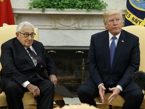 President Donald Trump meets with former Secretary of State Henry Kissinger in the Oval Office of the White House, Tuesday, Oct. 10, 2017, in Washington. (AP Photo/Evan Vucci)