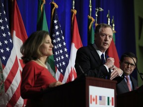 United States Trade Representative Robert Lighthizer, center, with Canadian Minister of Foreign Affairs Chrystia Freeland, left, and Mexico's Secretary of Economy Ildefonso Guajardo Villarrea, right, speaks during the conclusion of the fourth round of negotiations for a new North American Free Trade Agreement (NAFTA) in Washington, Tuesday, Oct. 17, 2017. (AP Photo/Manuel Balce Ceneta)