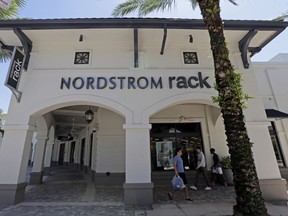 This Tuesday, Aug. 29, 2017, photo, shows a Nordstrom Rack store in Miami. Nordstrom says it's temporarily halting an exploration into taking the company private. The retailer said that a group that includes several members of the Nordstrom family plans to resume looking into a possible deal after the holiday season ends. (AP Photo/Alan Diaz)
