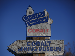 A sign for the Cobalt Mining Museum is displayed in Cobalt, Ont. Global demand for cobalt, a component in batteries used to power electric cars for automakers from Tesla Inc. to Volkswagen AG, is changing the importance of the metal. Cobalt, both the town and the metal, are also attracting renewed attention as a buffer to rising political risks in the Democratic Republic of Congo.