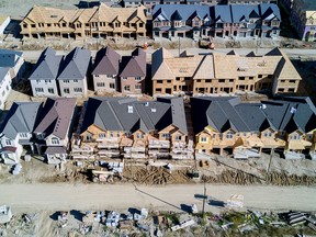 Homes under construction are seen in this aerial photograph taken above Brampton, Ontario. Toronto home builders are showing no signs of concern about the city's housing market.