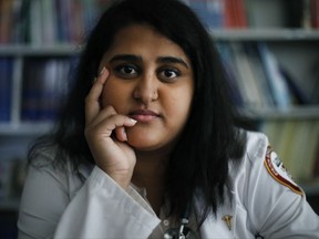 In this Oct. 5, 2017, photo, Zarna Patel poses for a portrait at the Loyola University Medical School in Maywood, Ill, Patel, a third year student who was brought to the U.S. from India as a 3-year old without any legal documents joins others in taking an active role in the debate over the future of an Obama-era program that shields hundreds of thousands of people from deportation. (AP Photo/Charles Rex Arbogast)