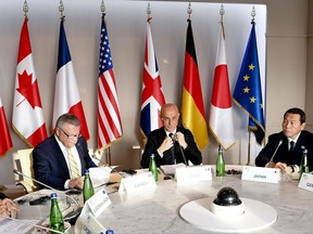 From left: Canada's Minister of Public Safety Ralph Edward Goodale, Italy's Minister of the Interior Marco Minniti, and Japan's National Public Safety Commission chairman Hachiro Okonogi attend the round table of the opening session of a G7 of Interior Ministers, on the island of Ischia, near Naples, Italy. The G7 ministers, two EU commissioners and the Interpol secretary general opened their working session of a summit that will address the fight against terrorism, the contrast to foreign fighters and terrorism and radicalisation on internet. (Ciro Fusco/ANSA via AP)