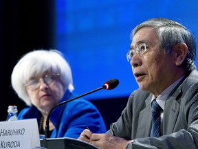 Bank of Japan Governor Haruhiko Kuroda speaks during the G30 International Banking Seminar in Washington, on Oct. 15, 2017. U.S. Federal Reserve Chair Janet Yellen looks on.