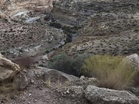 In this Oct. 2, 2017, photo released by Kane County Search and Rescue shows the area where an older Texas couple who were rescued severely dehydrated but alive after they were stranded six days on a desolate dirt road in southern Utah that was impassable in their rental car in the Grand Staircase-Escalante National Monument in southern Utah. The couple ended up on the rocky road Sept. 26 while following directions from a GPS-mapping app on their way to see Lake Powell. (Kane County Search and Rescue via AP)