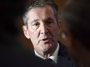 Manitoba Premier Brian Pallister speaks to reporters before a Council of the Federation meeting in Ottawa