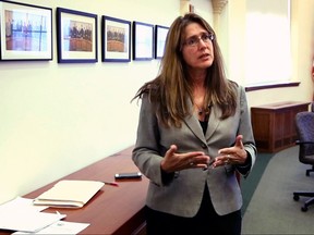 In this Monday, Oct. 23, 2017, photo State Rep. Deborah Sanderson, a Republican, explains her reasons for not wanting to expand Medicaid while speaking to reporter at the State House in Augusta, Maine. "It's a case of only having a certain amount of resources to take care of a large number of needs," Sanderson said. (AP Photo/Robert F. Bukaty)